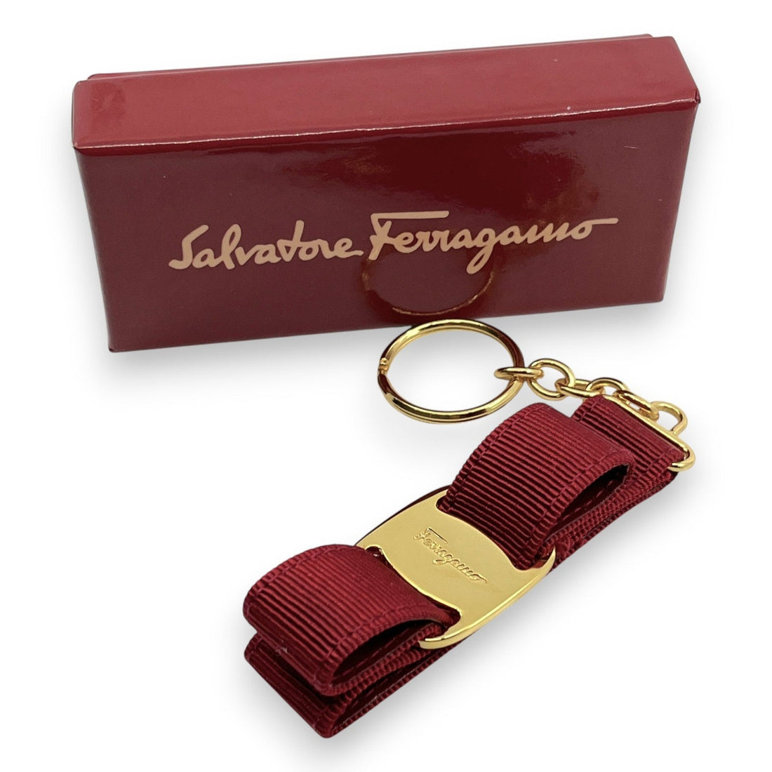Pre-owned Salvatore Ferragamo Vara ribbon keychain in red with box